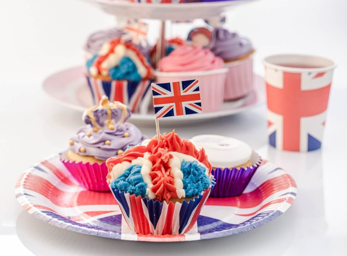 Cupcakes decorated with Union flags, and crowns