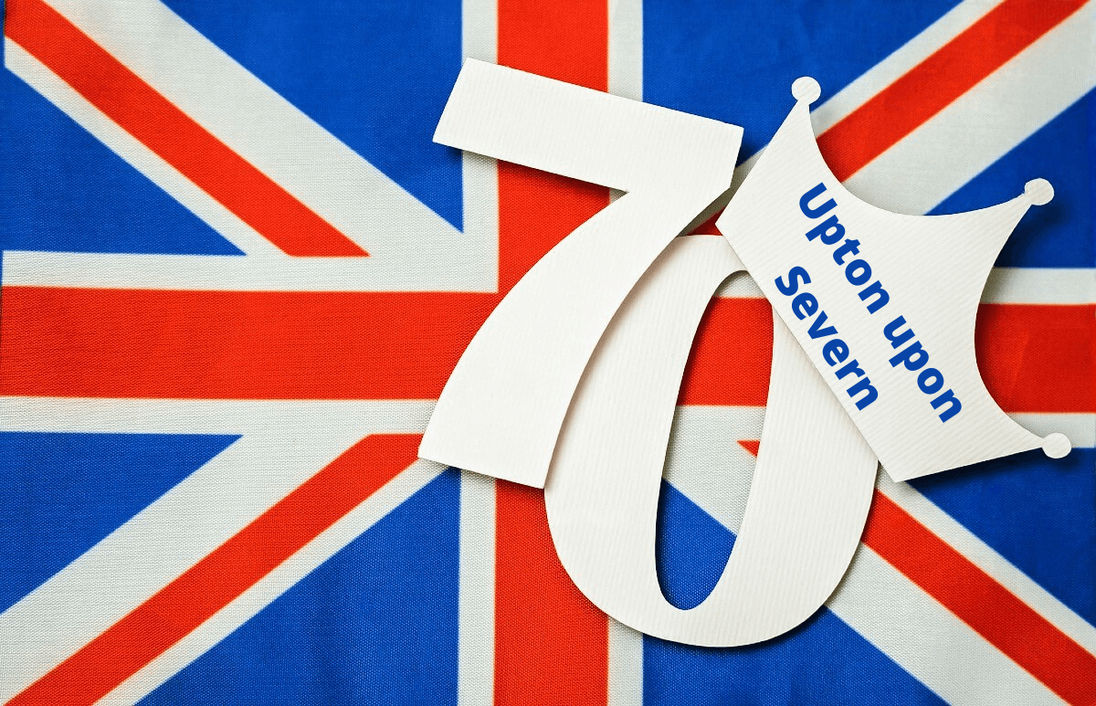 The Union Flag overlaid with a 70 wearing a crown