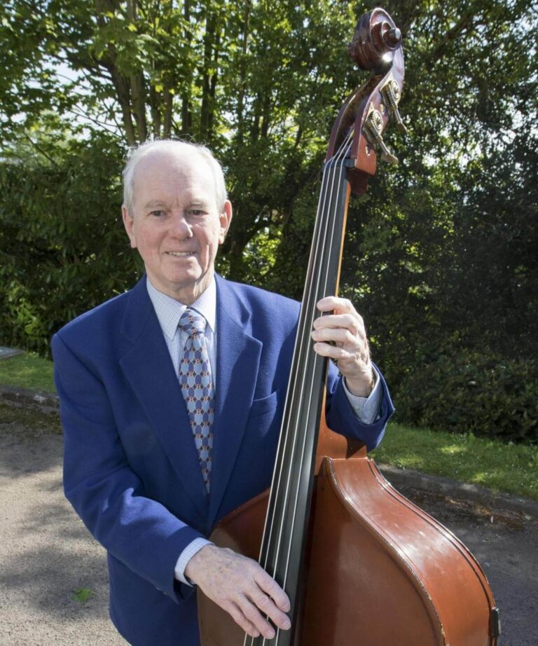 Len Thwaites poses with a double bass