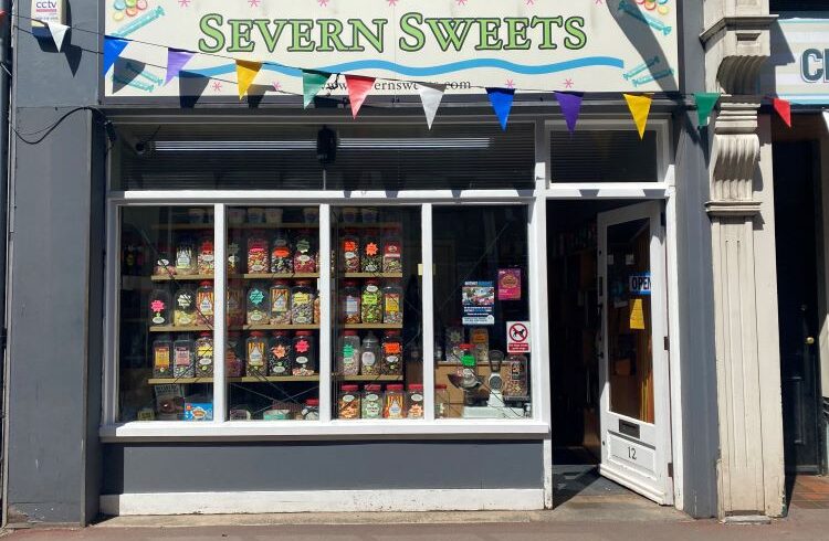 Sweet shop exterior with bunting and sweets display