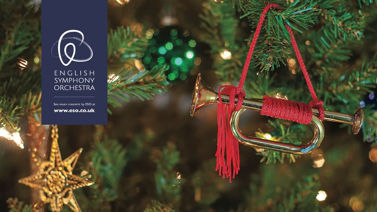 A miniature trumpet hanging from a Christmas tree