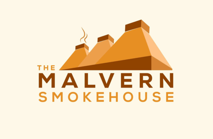 Malvern Smokehouse logo, three orange smoking chimneys on a pale orange background