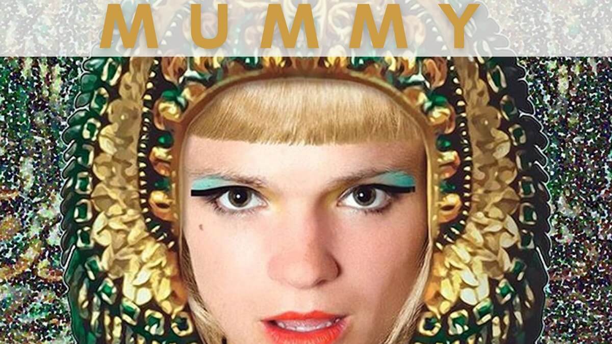 Text 'Mummy' above photo of woman in Ancient Egyptian-style make-up and dress