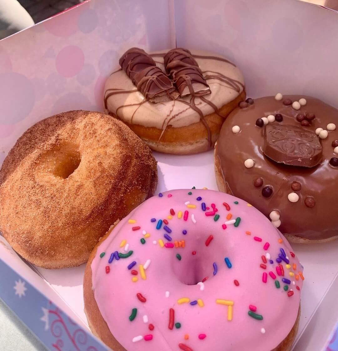 a selection of four different doughnuts