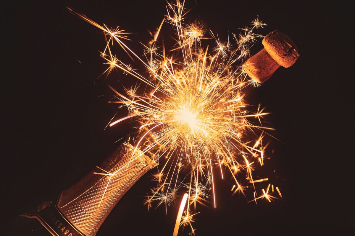 a Champaign popping with a sparkler