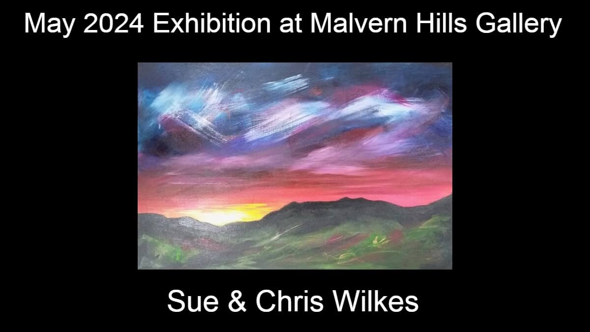 May 2024 Exhibition at Malvern Hills Gallery by Sue and Chris Wilkes - landscape image with blue and red sky above green landscape