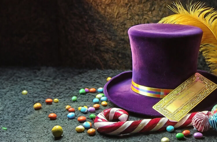 A red-and-white can, purple hat, yellow feather, sweets and a golden ticket