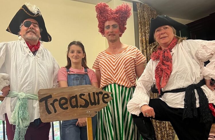 Actors dressed in costume for a children's play about pirates