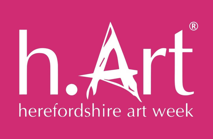 The logo for Herefordshire Art Week in white on a pink background