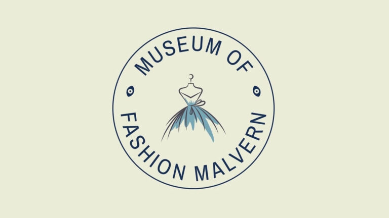 The Museum of Fashion logo: a blue circle on a cream background containing a drawing of a dress and the words 'Museum of Fashion Malvern'