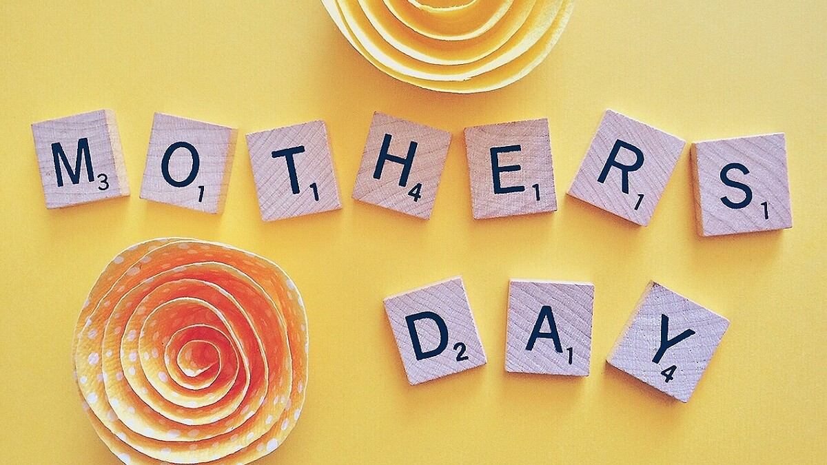 Mother's Day spelt out in tiles with flowers at top and bottom