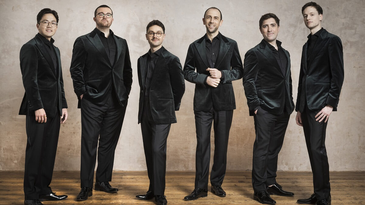 The King's Singers standing in formal dress
