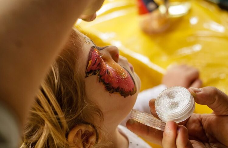 A child who has had their face painted